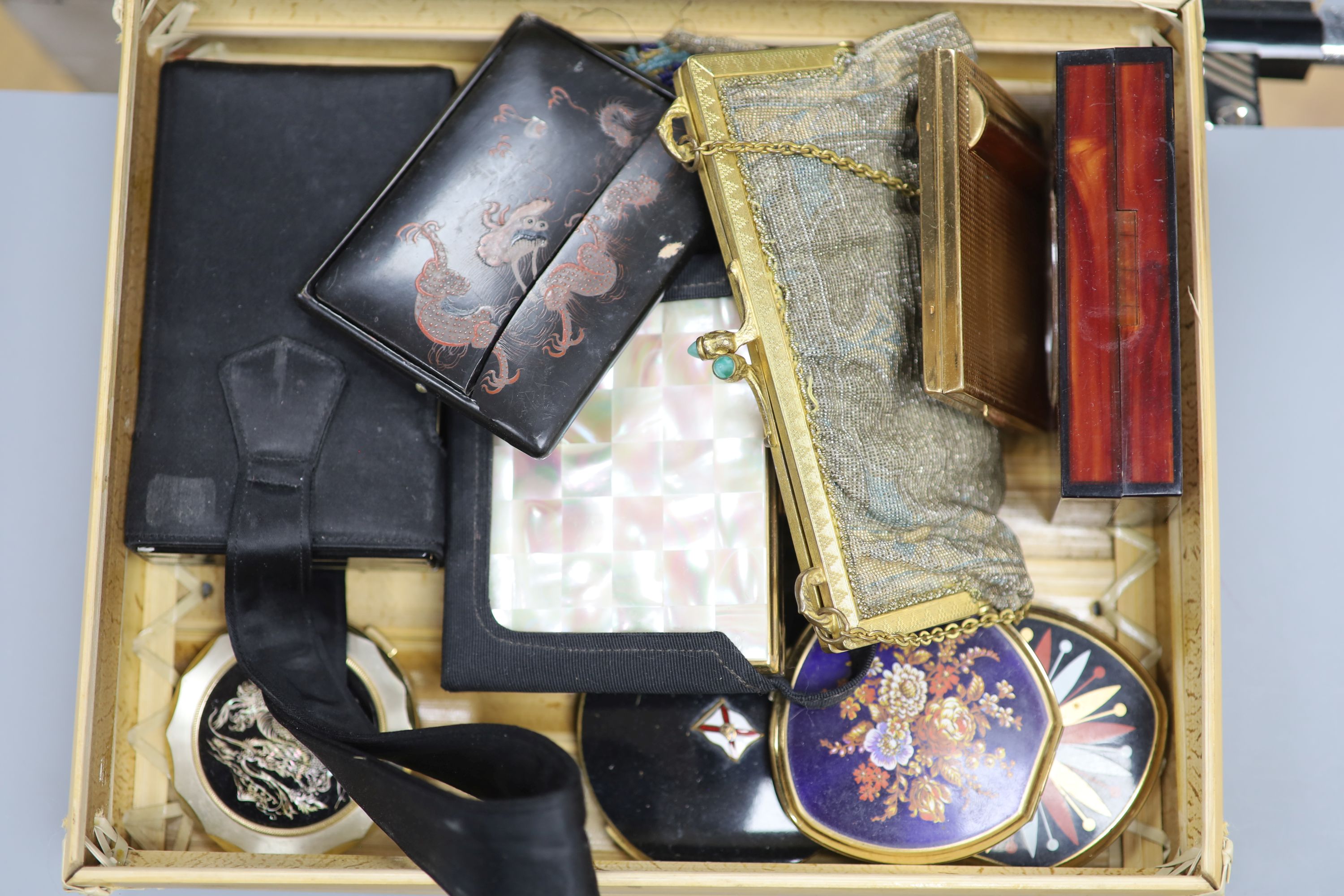 A misers purse, two beaded evening bags, compacts etc